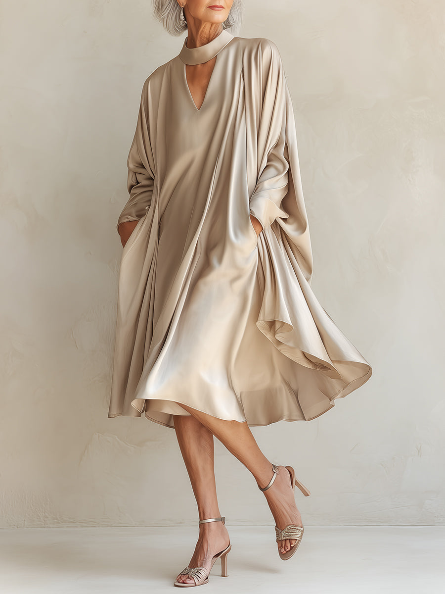 Robe midi élégante à manches chauve-souris et ourlet extra-large